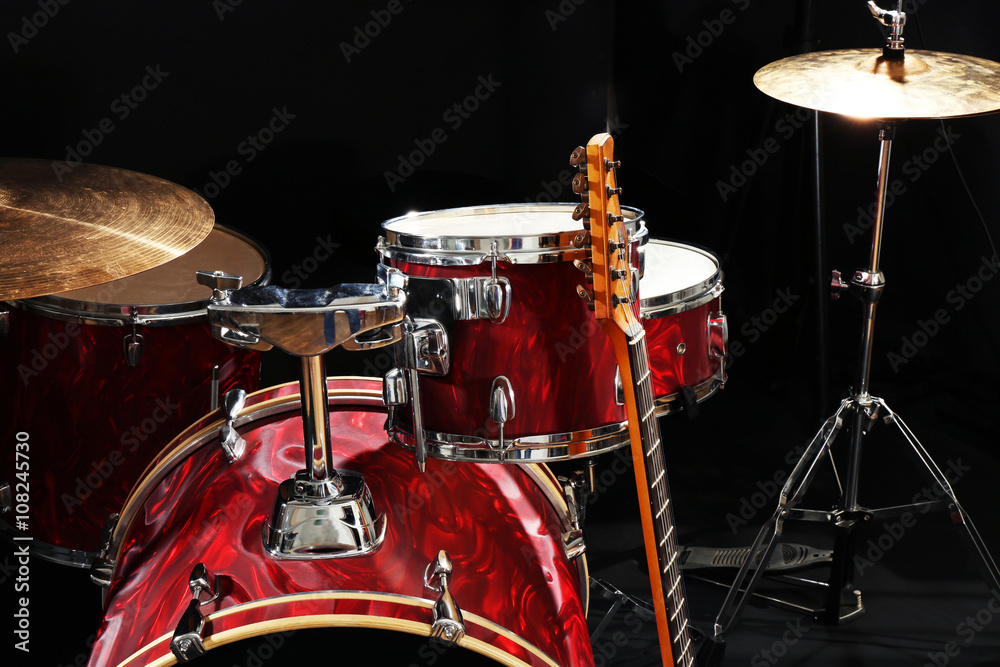 Musical instruments on a stage on dark background