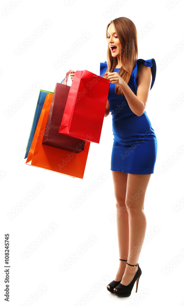 Young pretty woman with shopping packages isolated on white Young pretty woman with shopping packages isolated on white