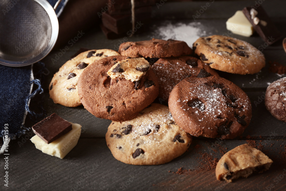 Chocolate chip cookies on wooden background
