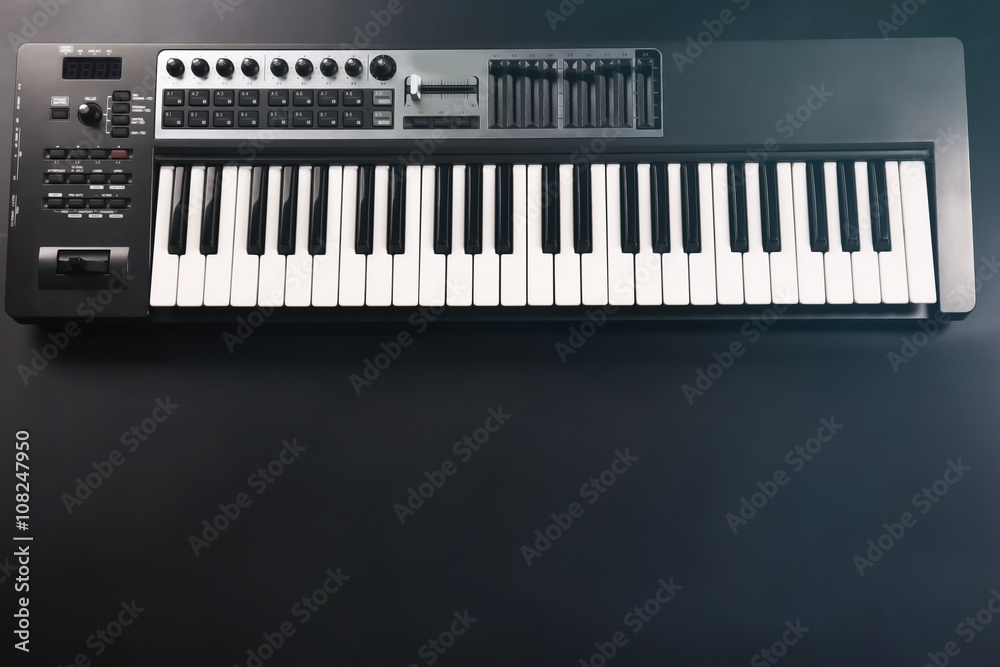 Fototapeta premium Keyboard of synthesizer closeup