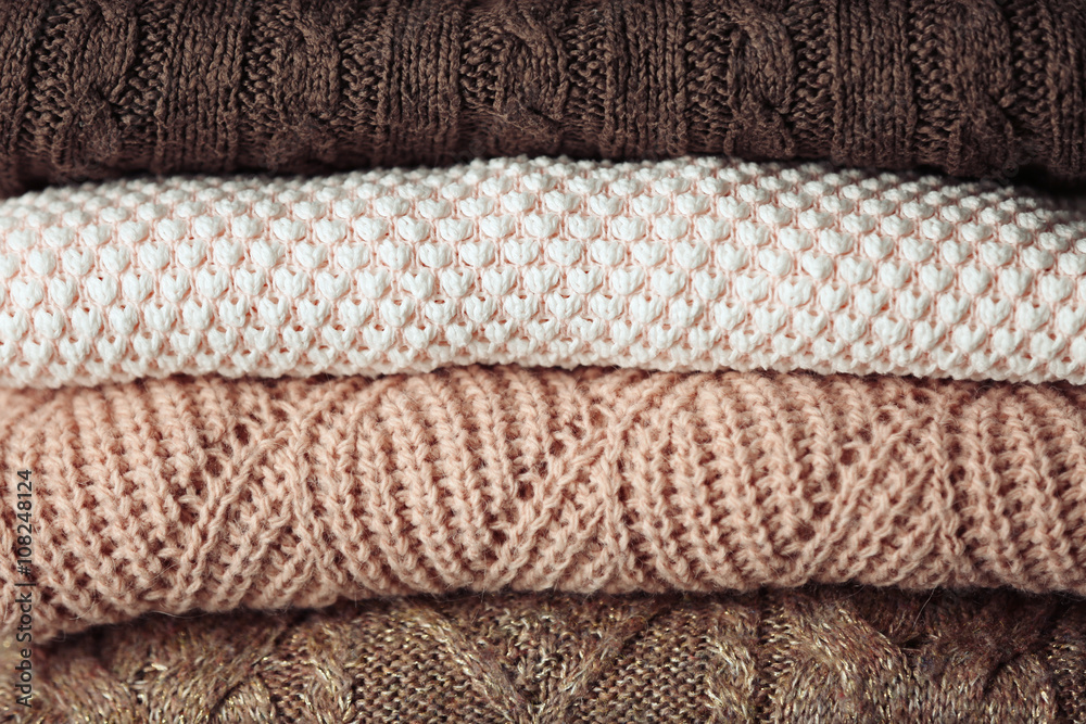 Stack of knitted clothes closeup Stack of knitted clothes closeup