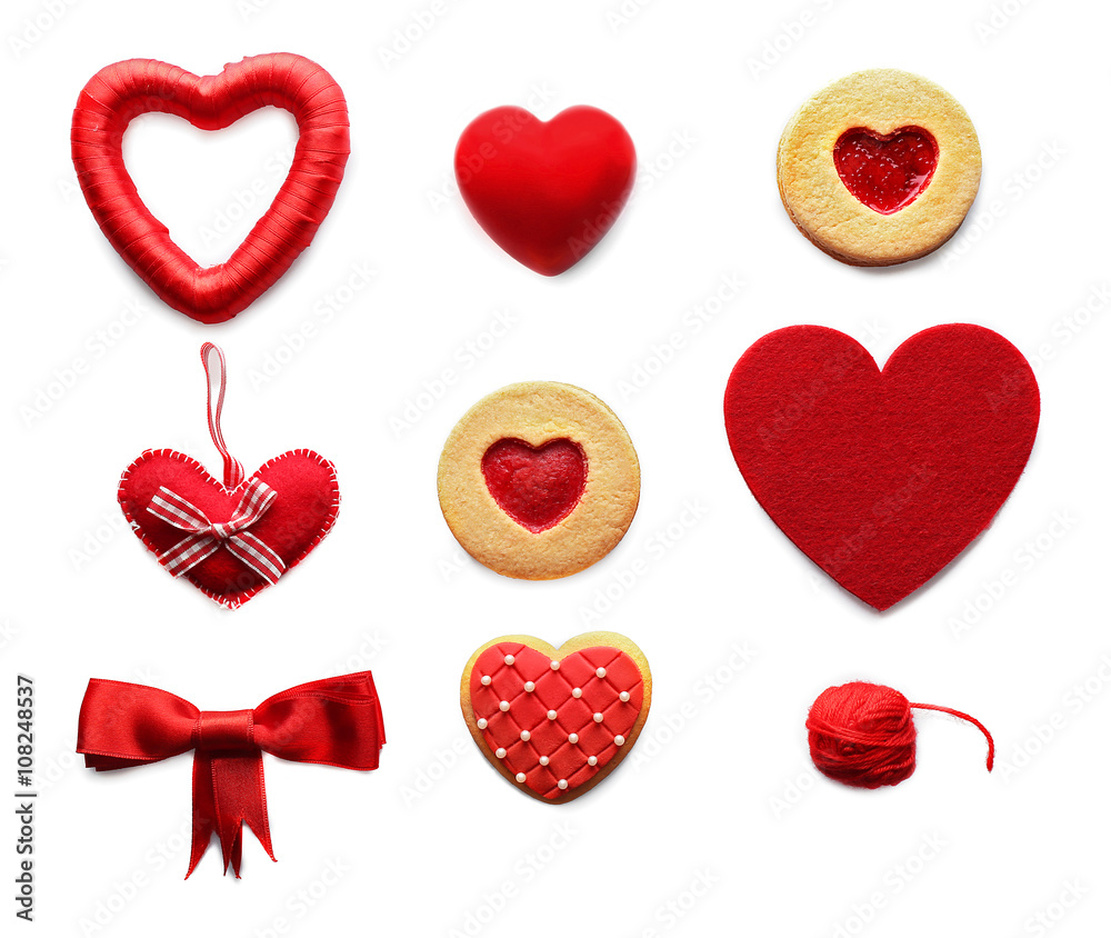 Set of cakes and fabric hearts, isolated on white Set of cakes and fabric hearts, isolated on white