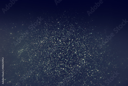 glitter vintage lights background. blue  silver and black. defoc