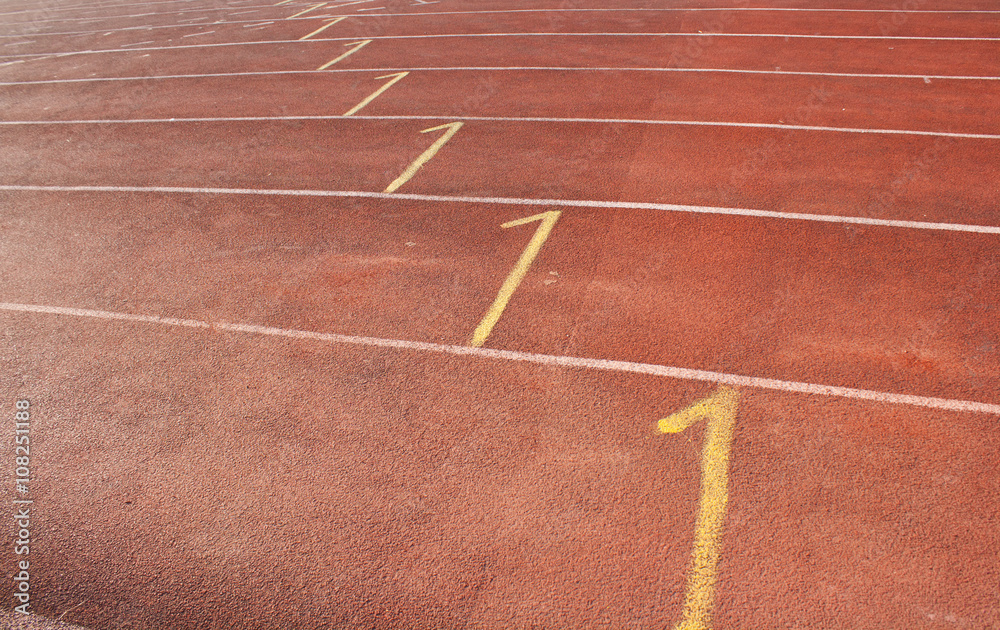 Ground athletics track has a symbol on the floor at the start.
