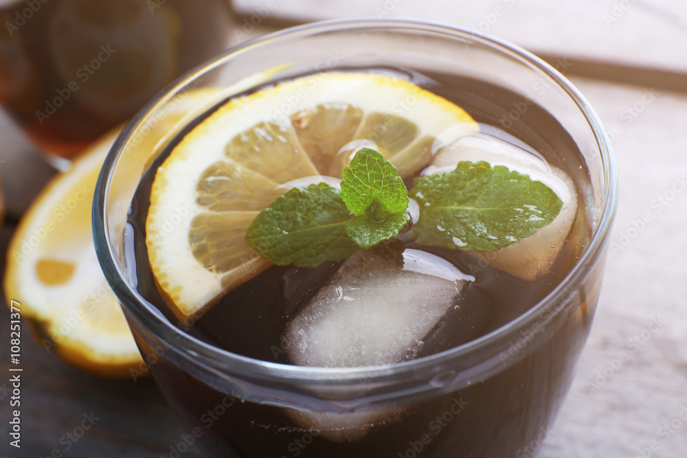 Glass of cola with ice, close up Glass of cola with ice, close up