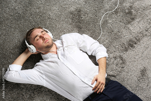Young man with headphones l...