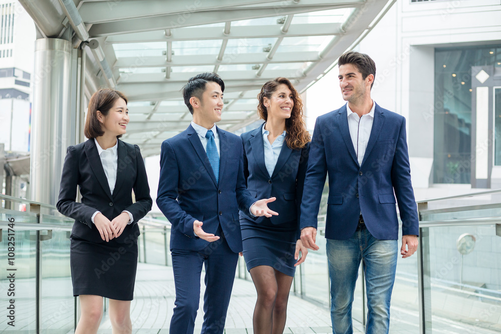 Group of business people talking to each other Group of business people talking to each other