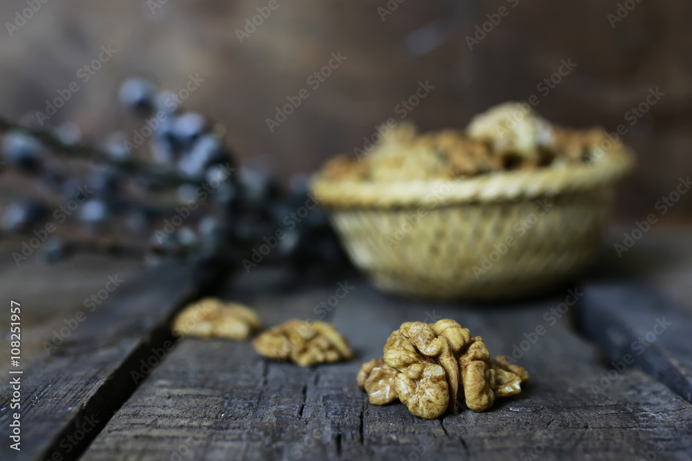 peeled walnut on a wooden background peeled walnut on a wooden background