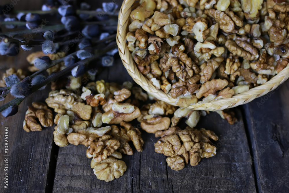 peeled walnut on a wooden background peeled walnut on a wooden background