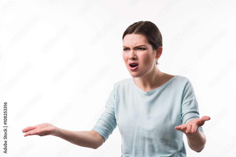 Angry girl standing isolate on white background Angry girl standing isolate on white background