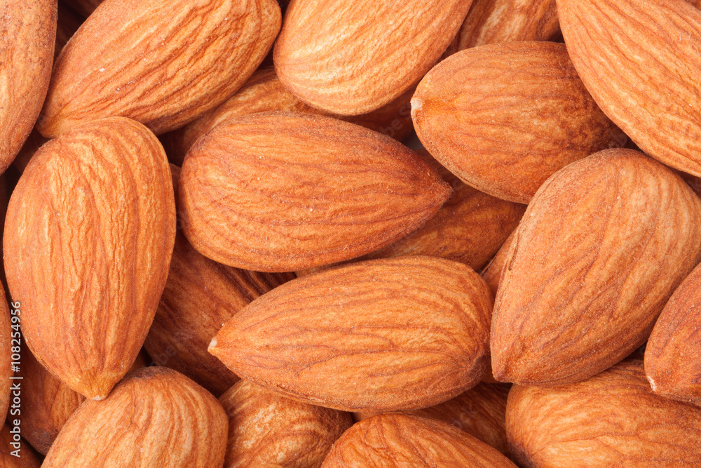 nuts peeled almonds as a background close-up macro nuts peeled almonds as a background close-up macro