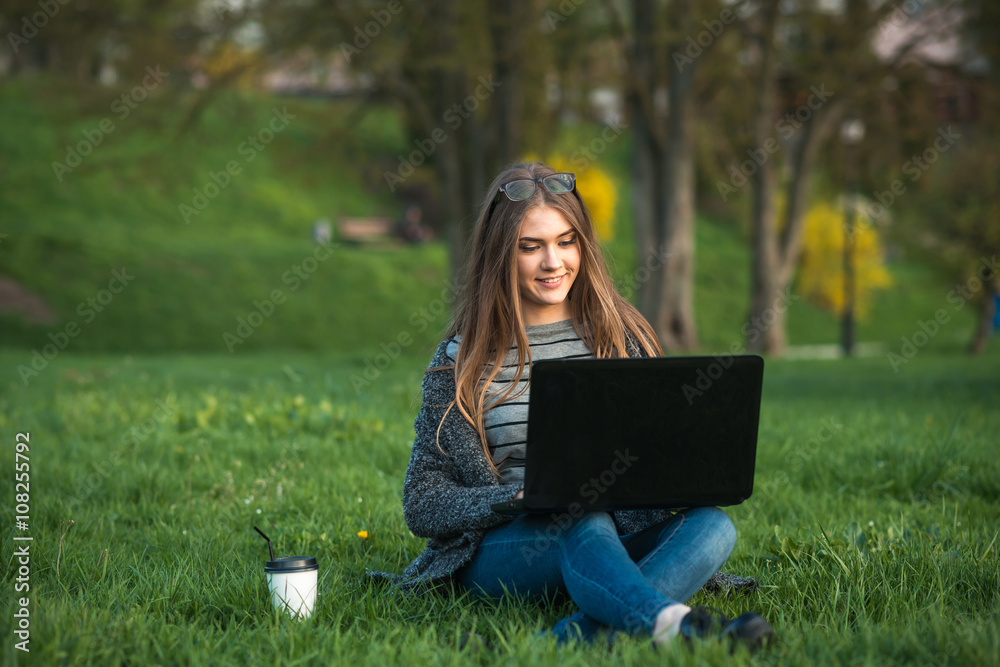 beautiful girl with a laptop and coffee beautiful girl with a laptop and coffee