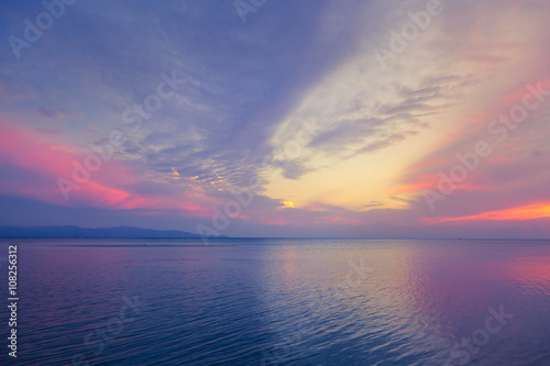 Beautiful purple sea sunset. © olezzo
