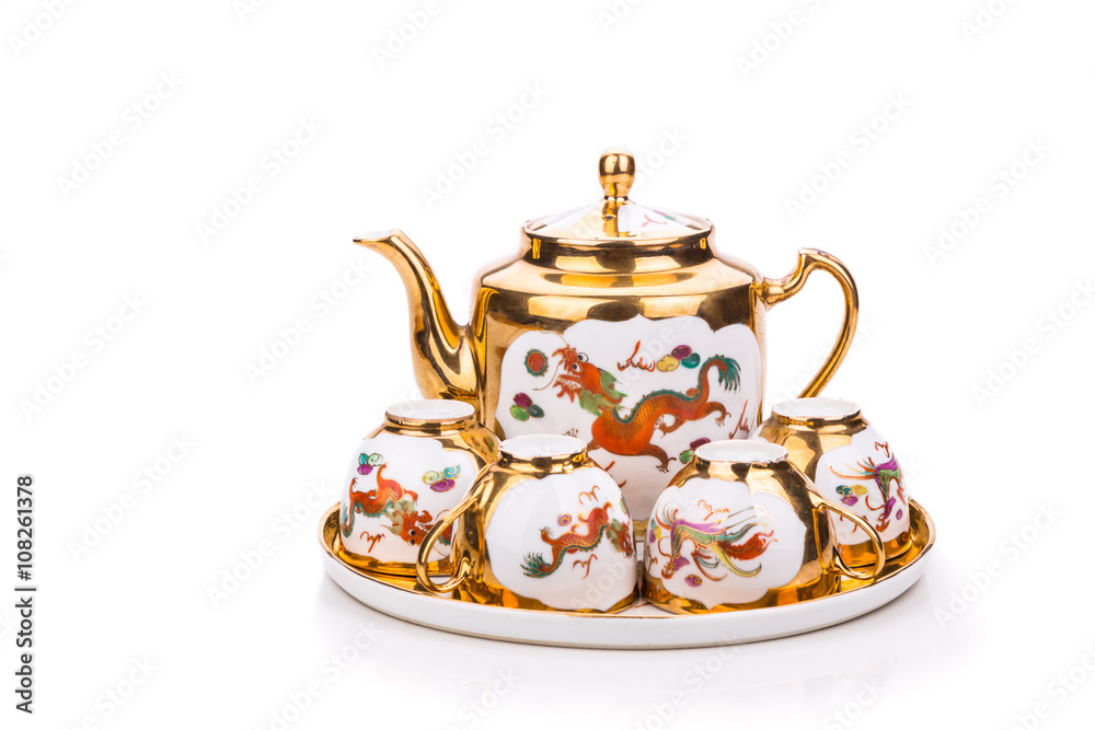 Generic traditional Chinese tea set with generic red envelope bearing the word double happiness, in white background
