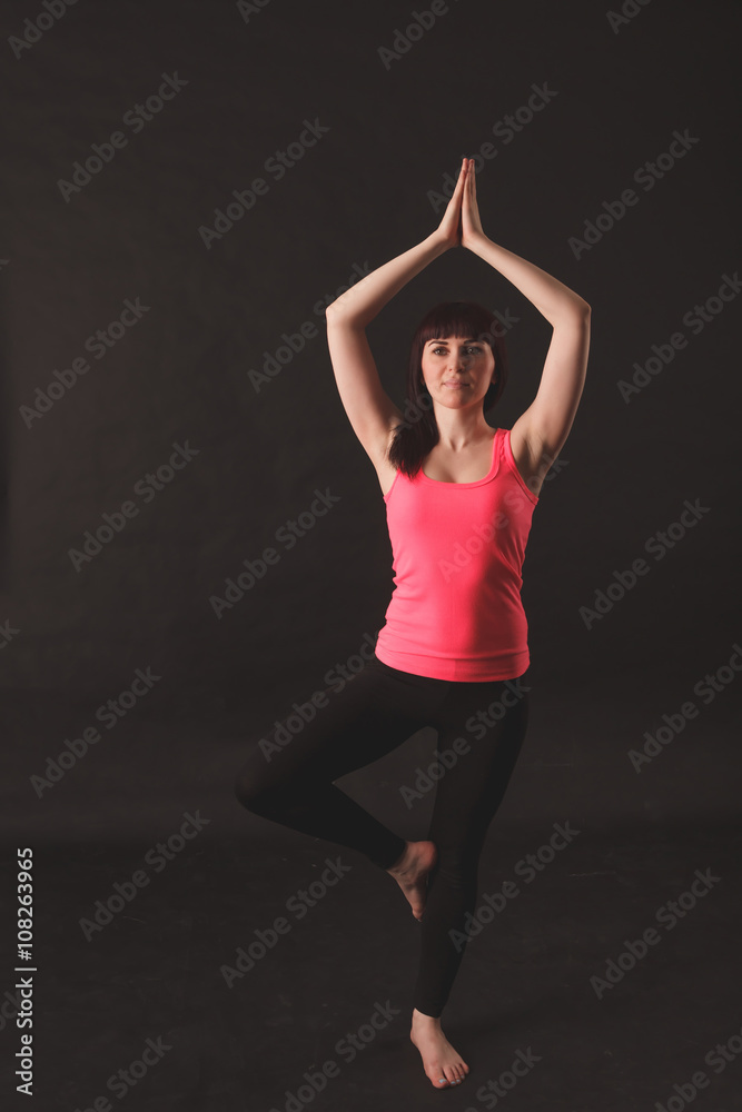 Woman doing stretching exercises Woman doing stretching exercises