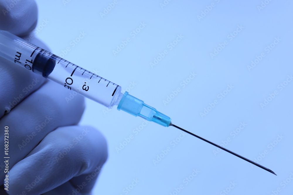 医療 注射器を持つ手 医療 注射器を持つ手