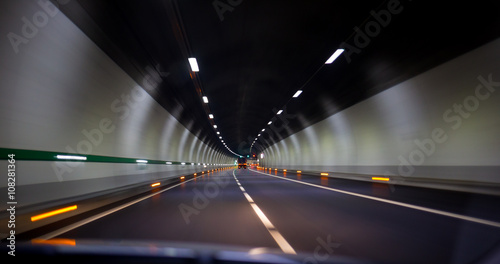 driving fast in a tunnel on the highway