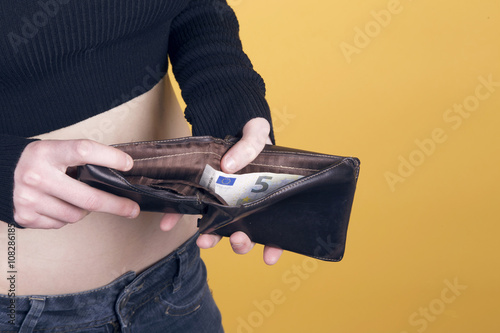 Woman with her old wallet.