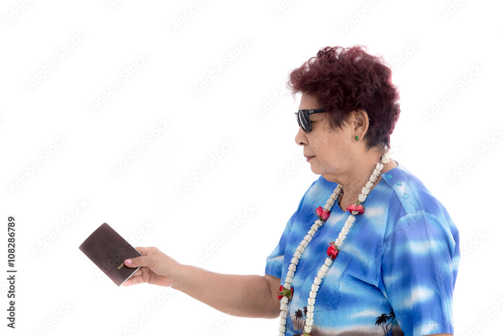 Expressive old woman in loud shirt holiday holding passport conc Expressive old woman in loud shirt holiday holding passport conc