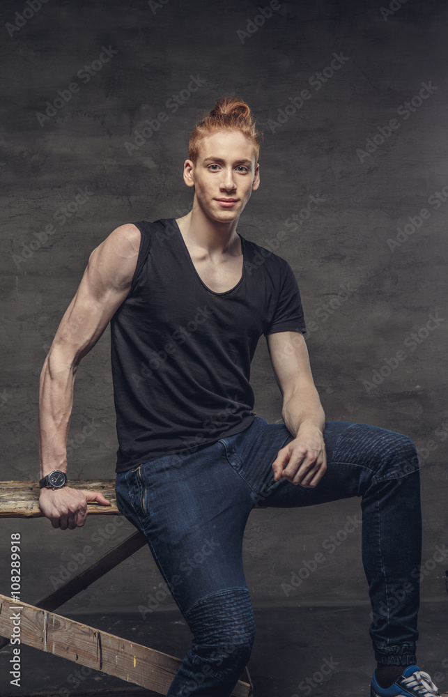 Casual redhead man in a studio. Casual redhead man in a studio.