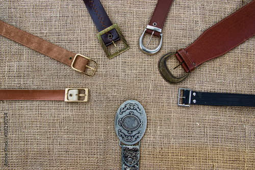 Leather Belts on natural Texture Background