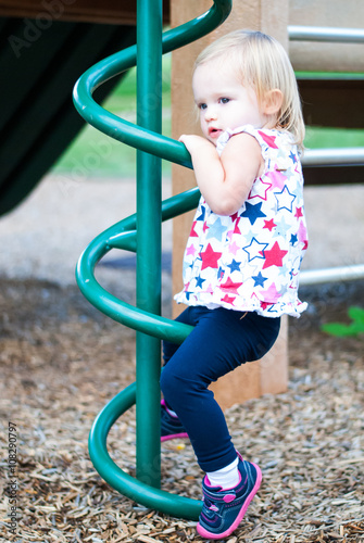 Little Girl Playing at the Park photo