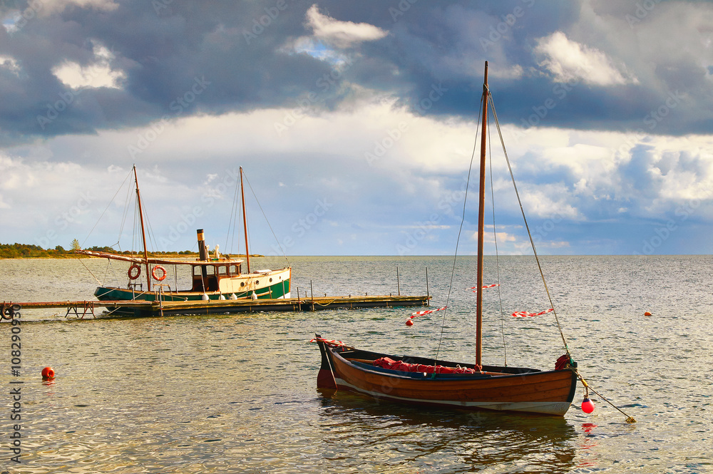 Anchored boats on shore of the sea