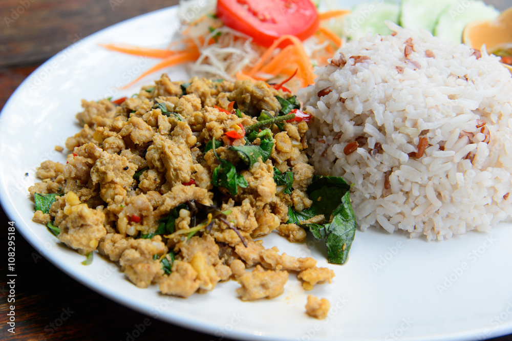 Rice topped with stir-fried pork and basil Rice topped with stir-fried pork and basil