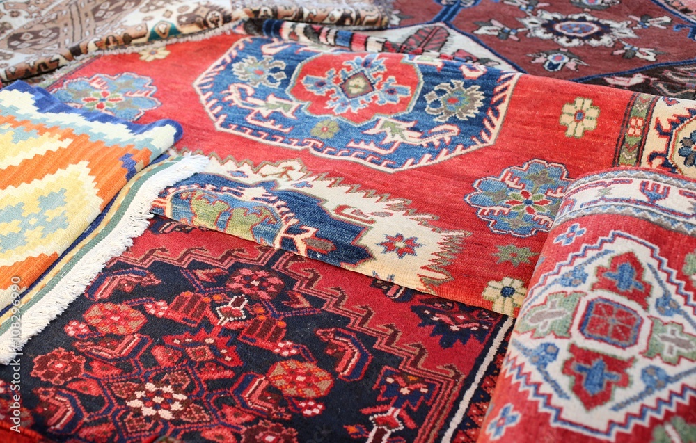many ancient wool rugs made by hand in the Middle East
