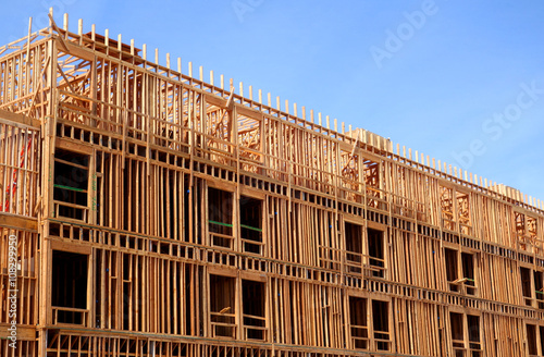 building under construction in the framing stage