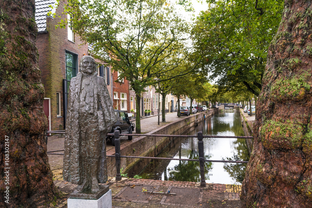 Typical Dutch street and canal along the Zuider Havendijk in Enkhuizen, Netherlands