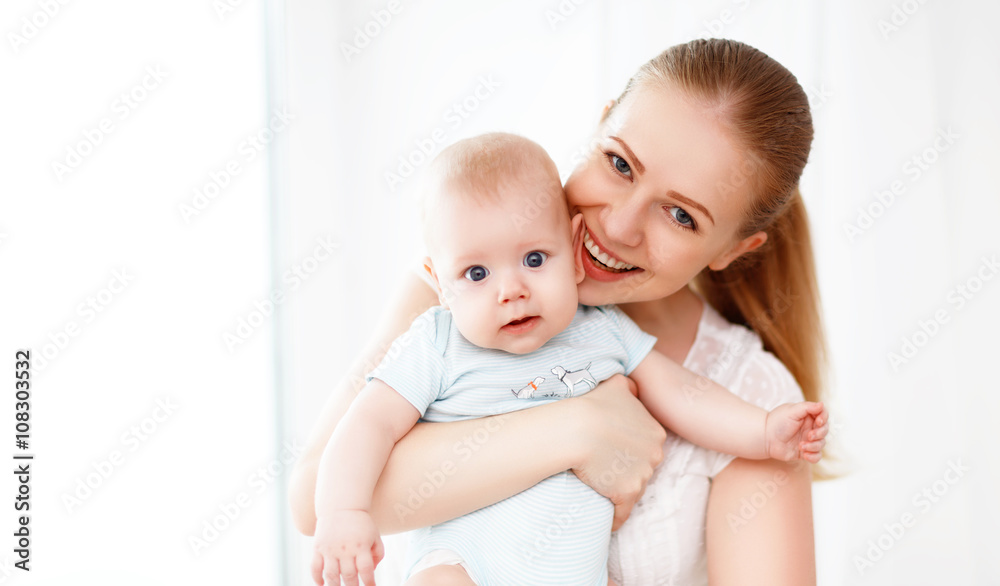 happy family mother playing with baby happy family mother playing with baby