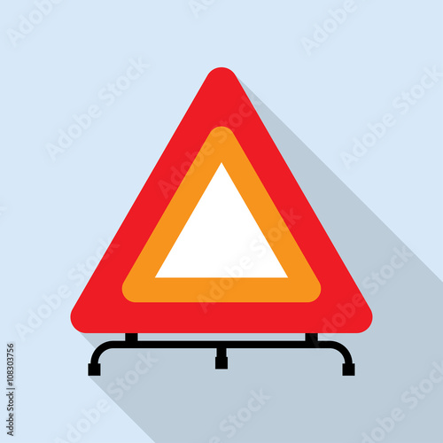 Red reflecting traffic warning triangle
