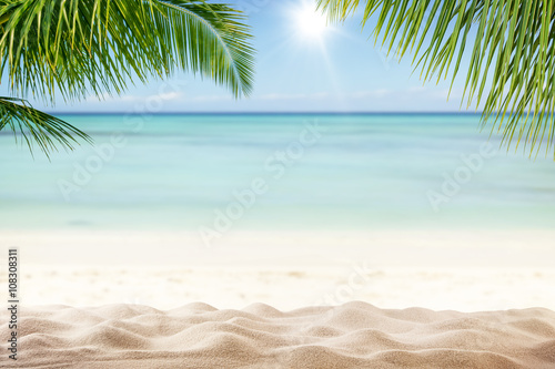Fototapeta Naklejka Na Ścianę i Meble -  Summer sandy beach with blur ocean on background