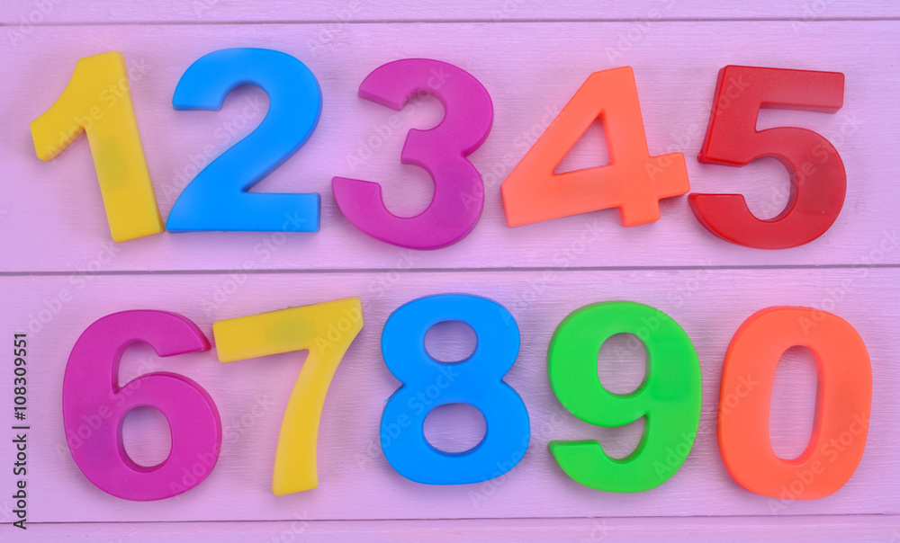 Fototapeta premium Numbers on purple table