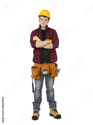 young male carpenter with arm crossed