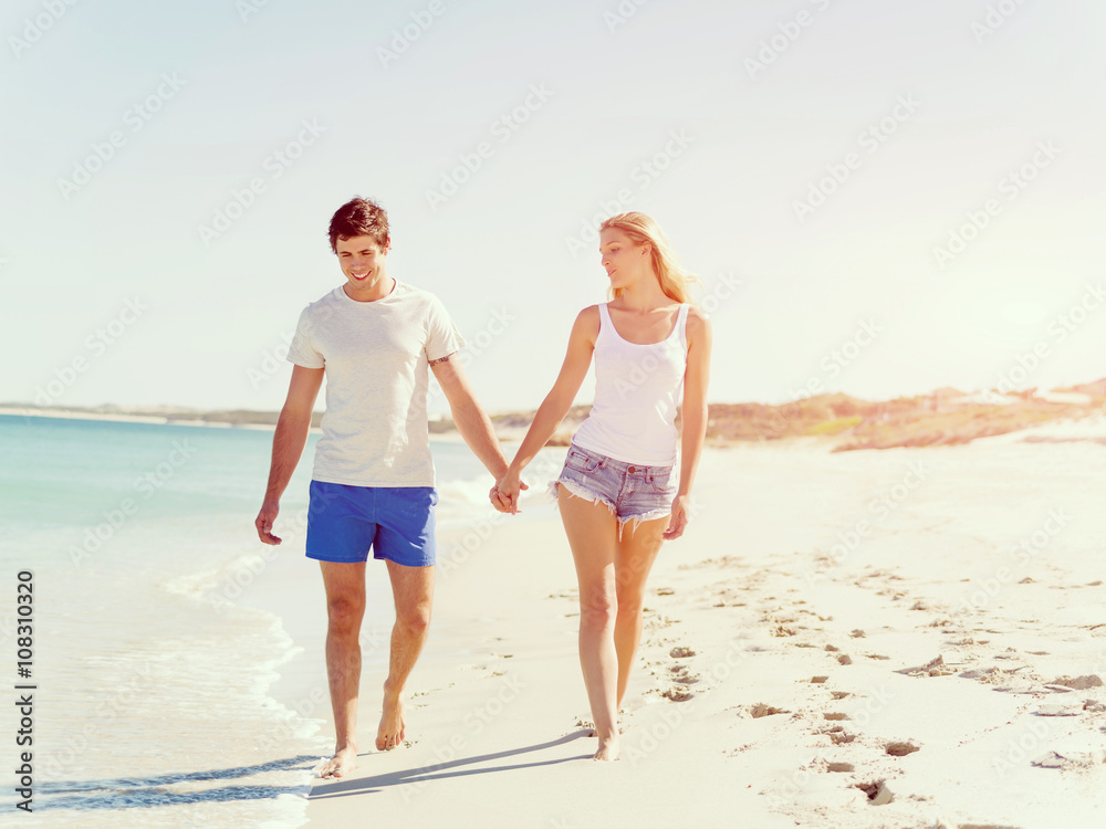 Romantic young couple on the beach Romantic young couple on the beach