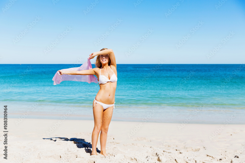 Young woman relaxing on the beach