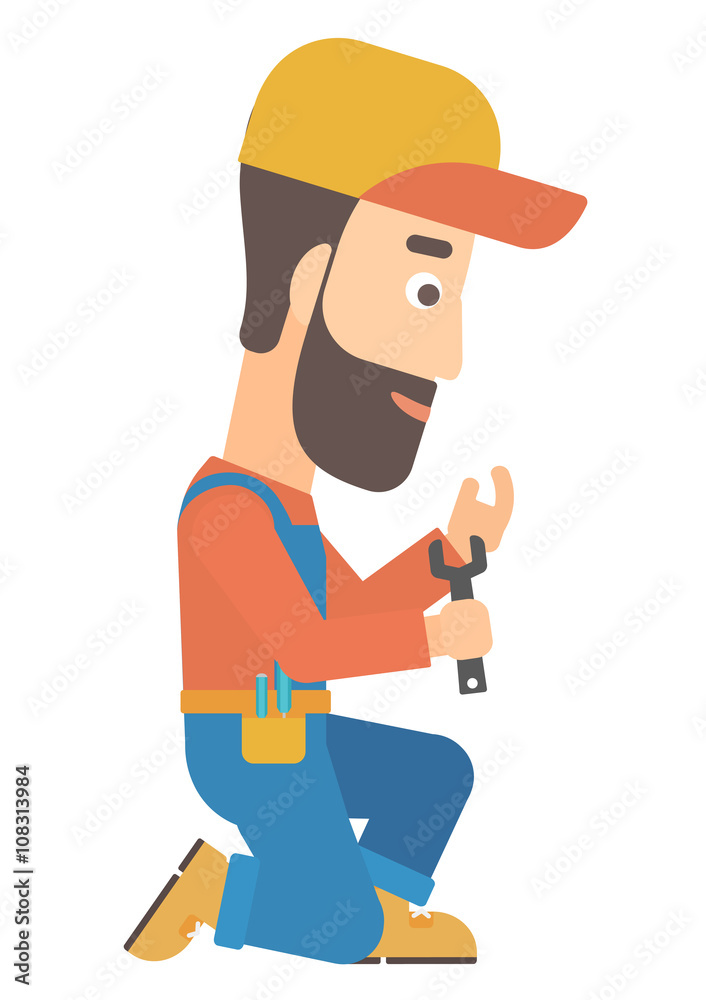 Repairman holding spanner.