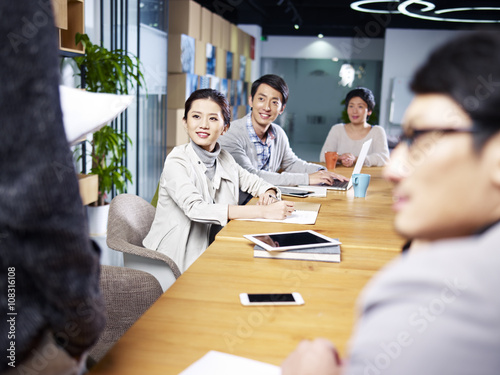 Photography team of asian business executive meeting in office