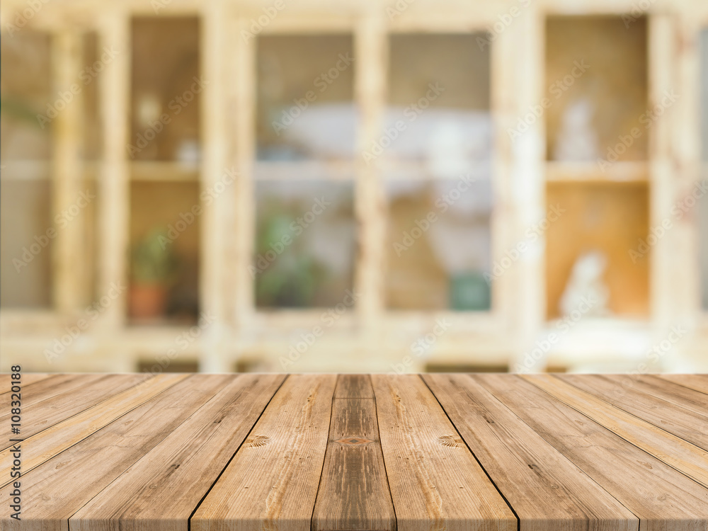 Wooden board empty table in front of blurred background. Perspective brown wood over blur in coffee shop - can be used for display or montage your products.Mock up for display of product. Wooden board empty table in front of blurred background. Perspective brown wood over blur in coffee shop - can be used for display or montage your products.Mock up for display of product.