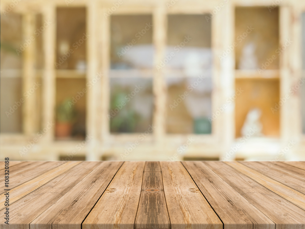 Wooden board empty table in front of blurred background. Perspective brown wood over blur in coffee shop - can be used for display or montage your products.Mock up for display of product.