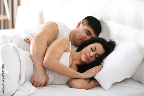 Lovely couple sleeping in w...