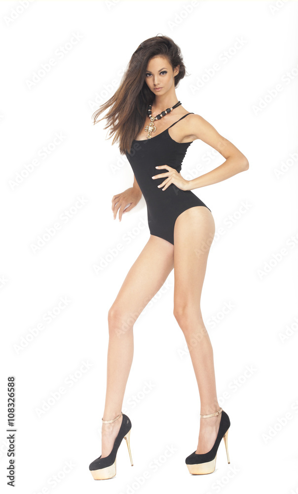 Beautiful brunette fashion model on white background Beautiful brunette fashion model on white background