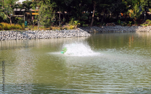 PADDLE WHEEL AERATOR with water splash is working in pool