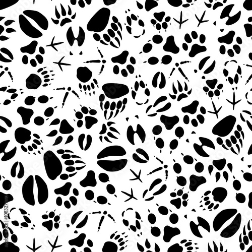 Animal tracks black and white seamless pattern