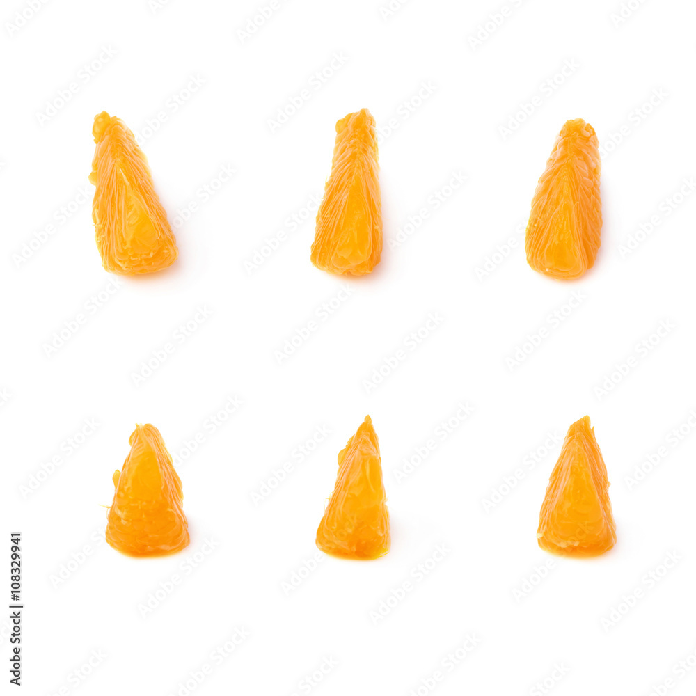 Slice sections of tangerine isolated over the white background Slice sections of tangerine isolated over the white background