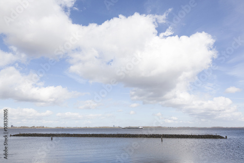 cloudscape above ship on Gooimeer in the netherlands © ahavelaar