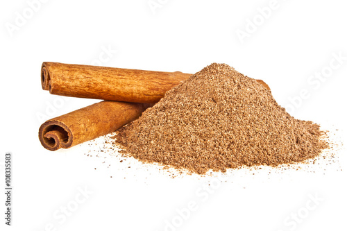 Cinnamon sticks with powder isolated on white background