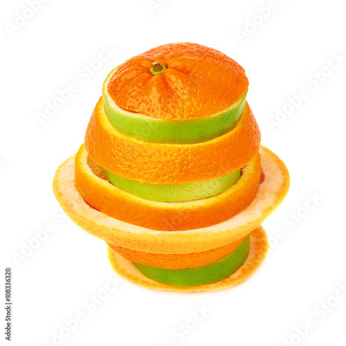 Stack of citrus sliced fruits over white isolated background